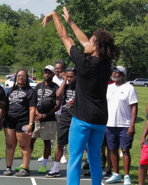 Shooter in front of the crowd