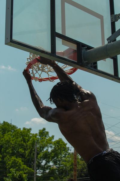 Player hanging on the rim