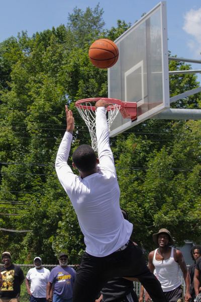 Player rising for a layup